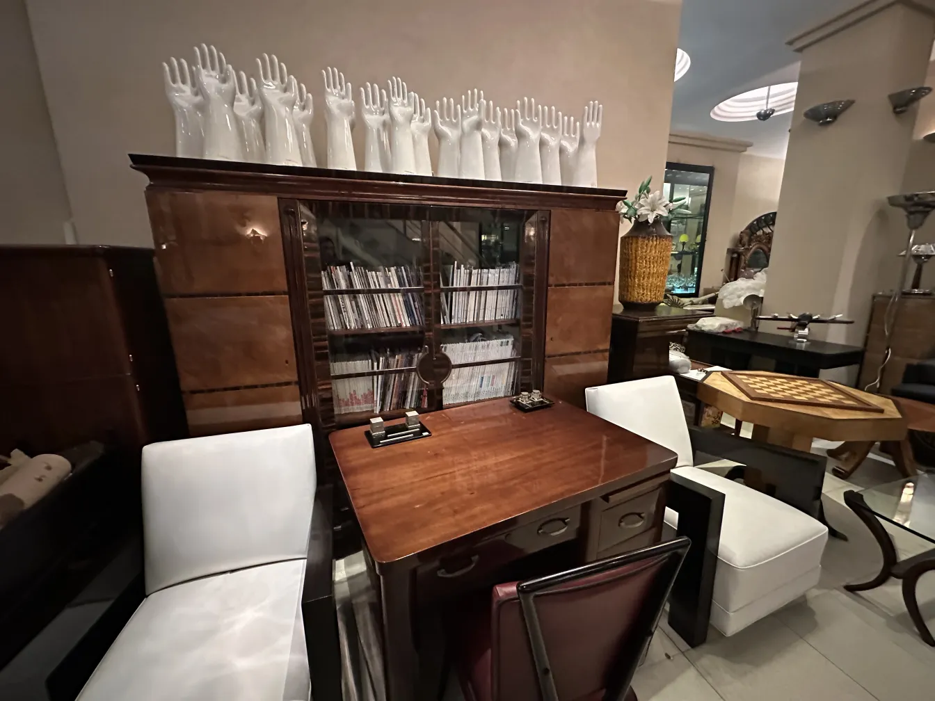 two antique armchairs with canvases in an elegant building