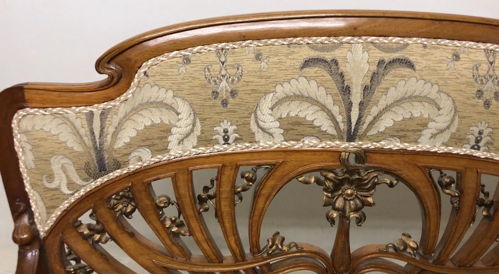 Three antique art nouveau armchairs with elegant design and intricate details