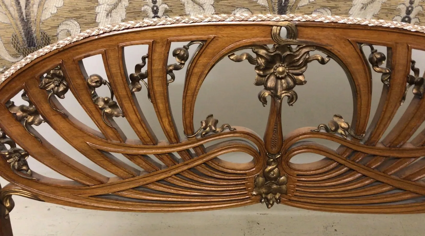 Three antique armchairs with ornate art nouveau design