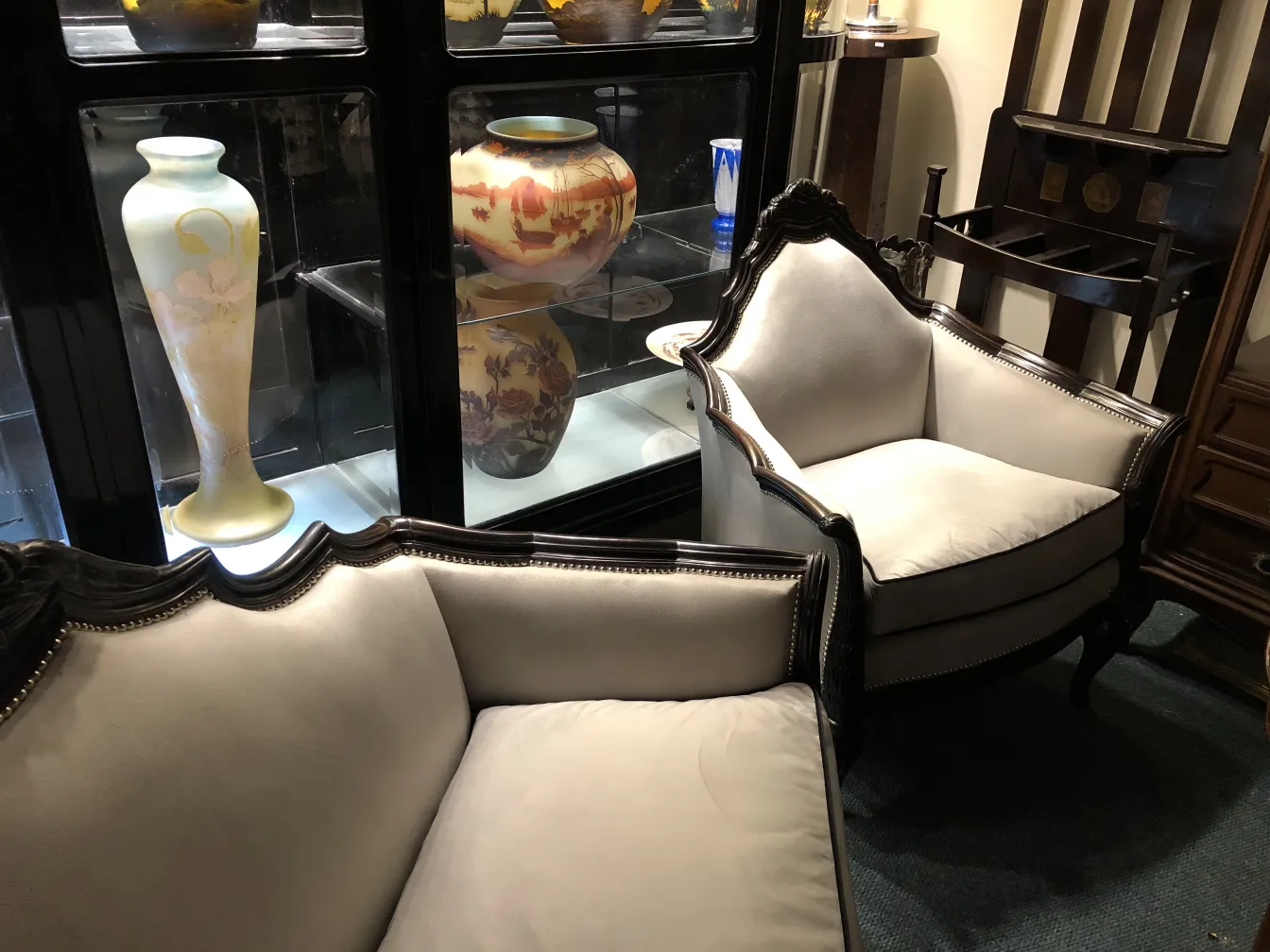 Three antique armchairs paul follot in a decorative setting