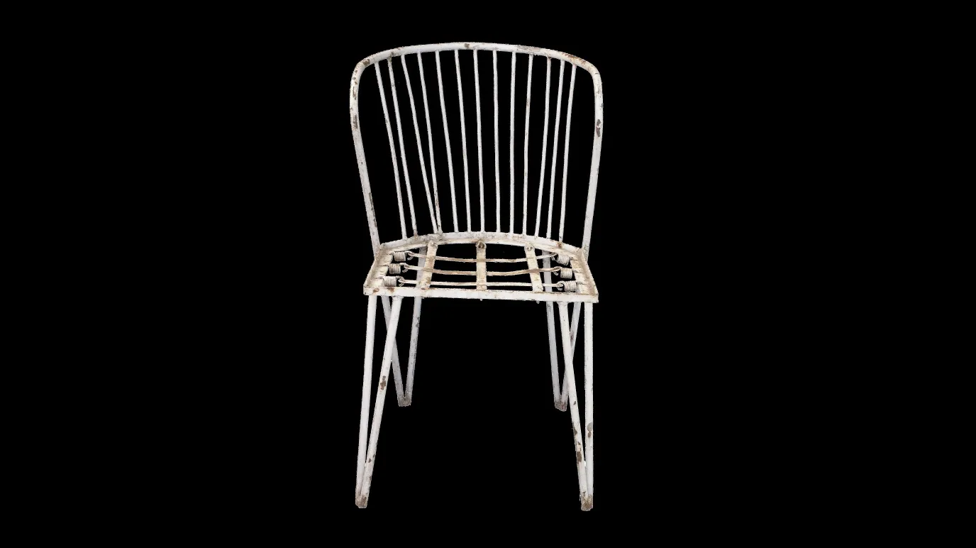 Antique garden chair with simple design and clean lines.