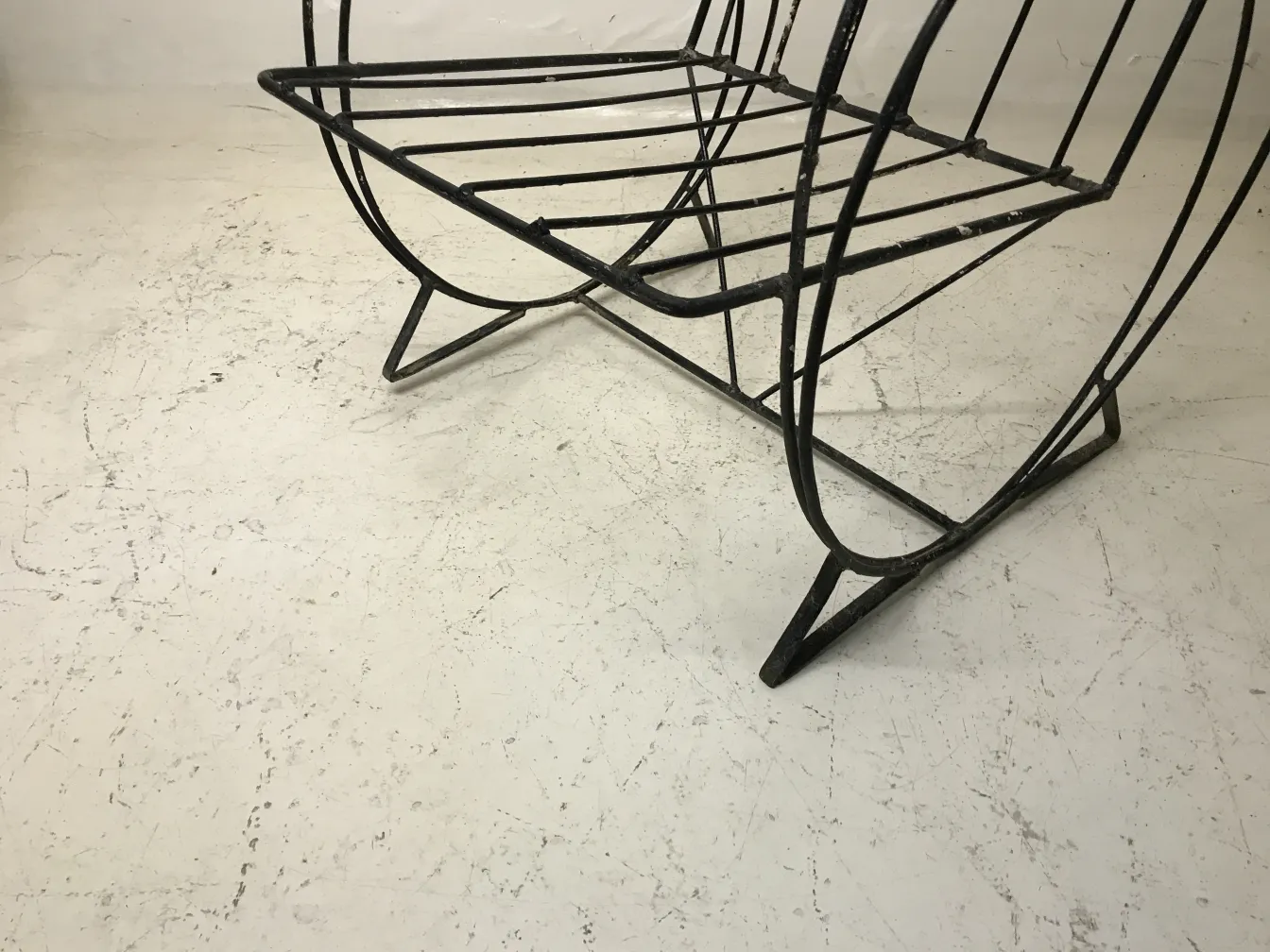 Two antique garden armchairs, featuring a stylish design