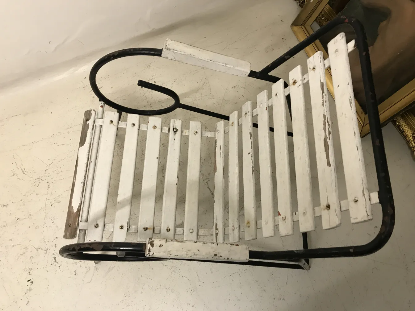 Top view of 8 antique garden armchairs in white and black