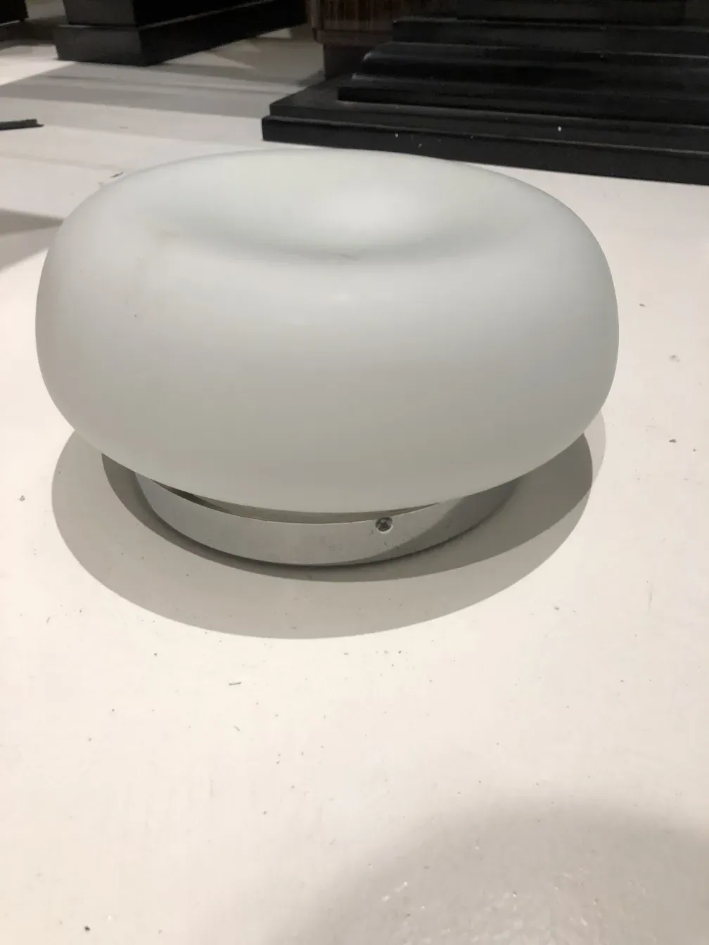 Round antique ceiling light with smooth finish