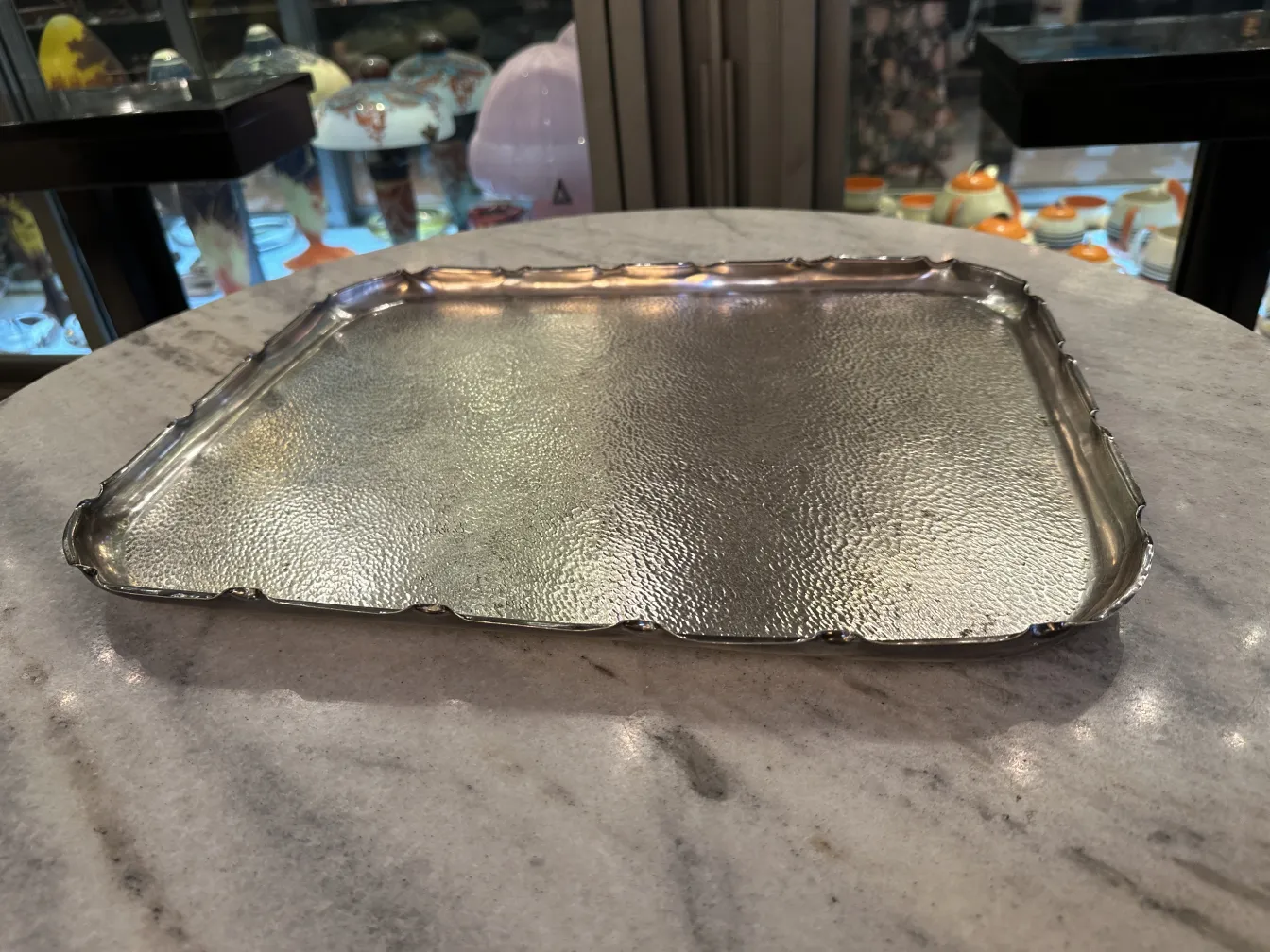 antique tray with decorative silver edges