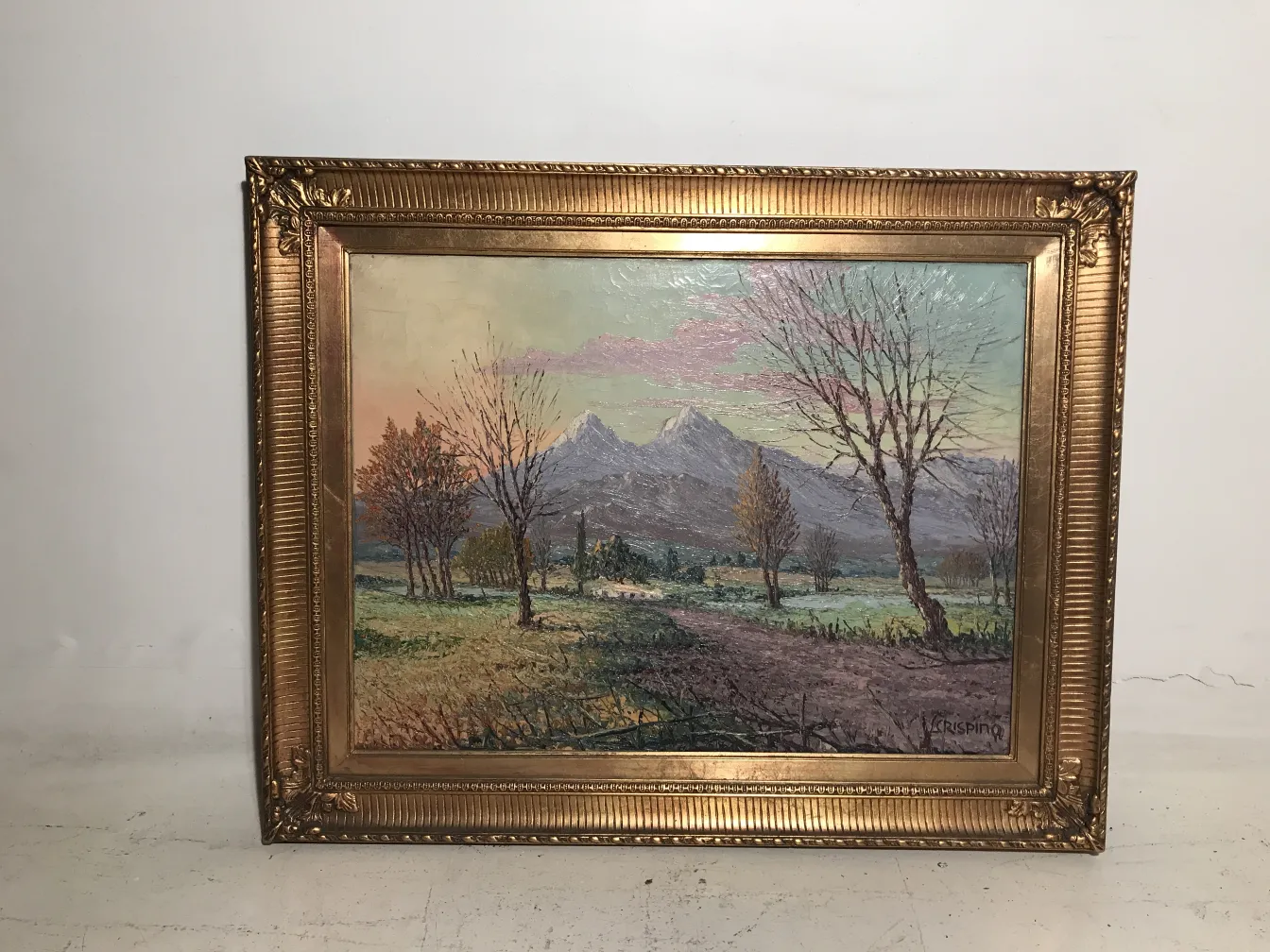 Pintura antiga de Crispino com paisagem montanhosa e árvores
