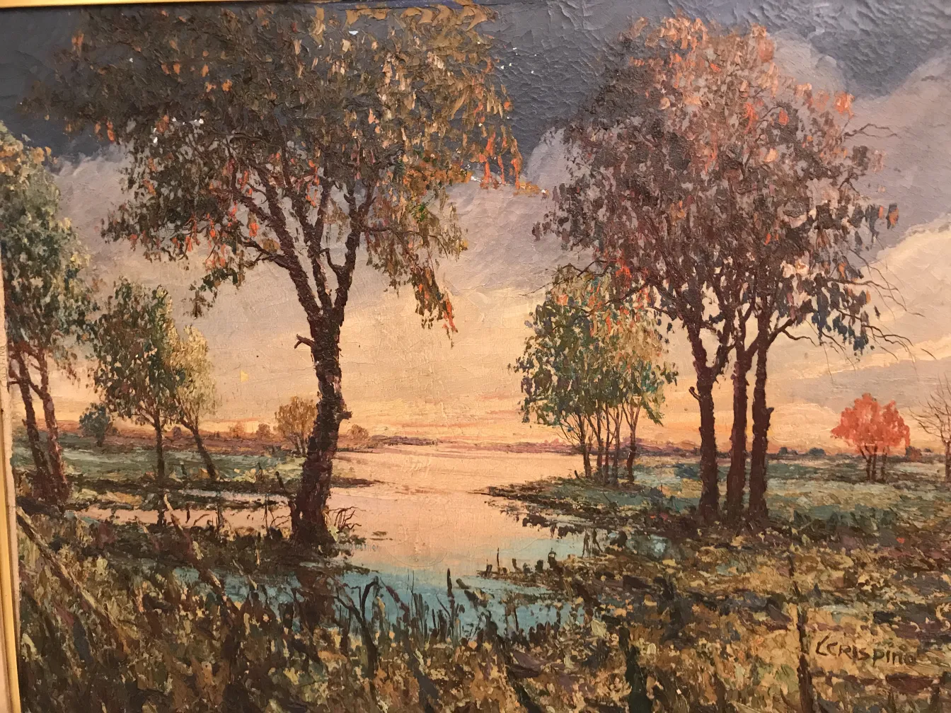 pintura antiga de crispino retratando uma paisagem com árvores e água ao pôr do sol