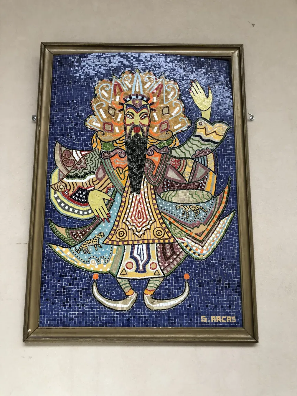 Quadro de mosaico antigo com design colorido e vibrante.