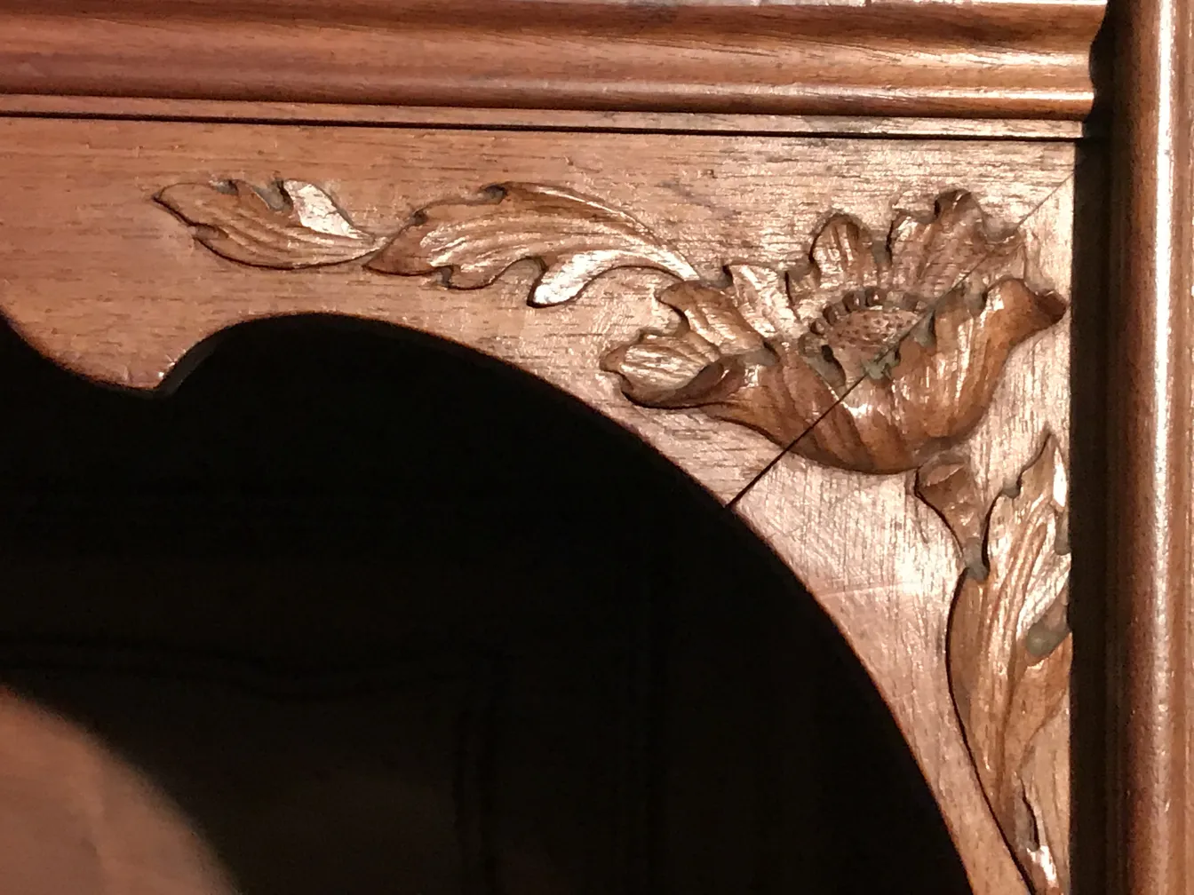 view of the antique display cabinet E.Dienst from Paris with floral details