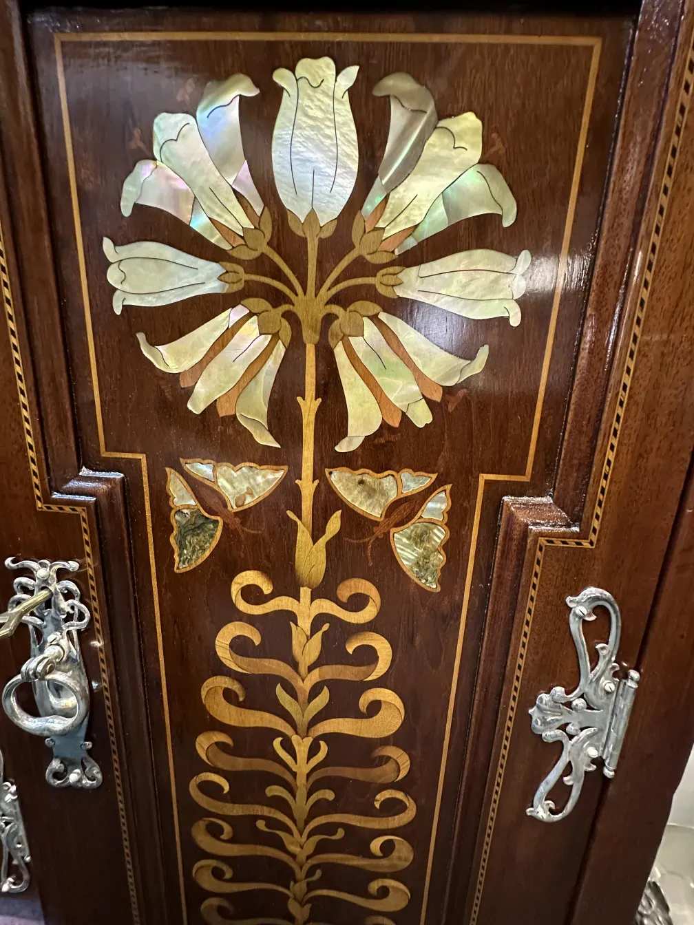 antique display cabinet featuring floral and leaf decorative details, Shapland & Petter