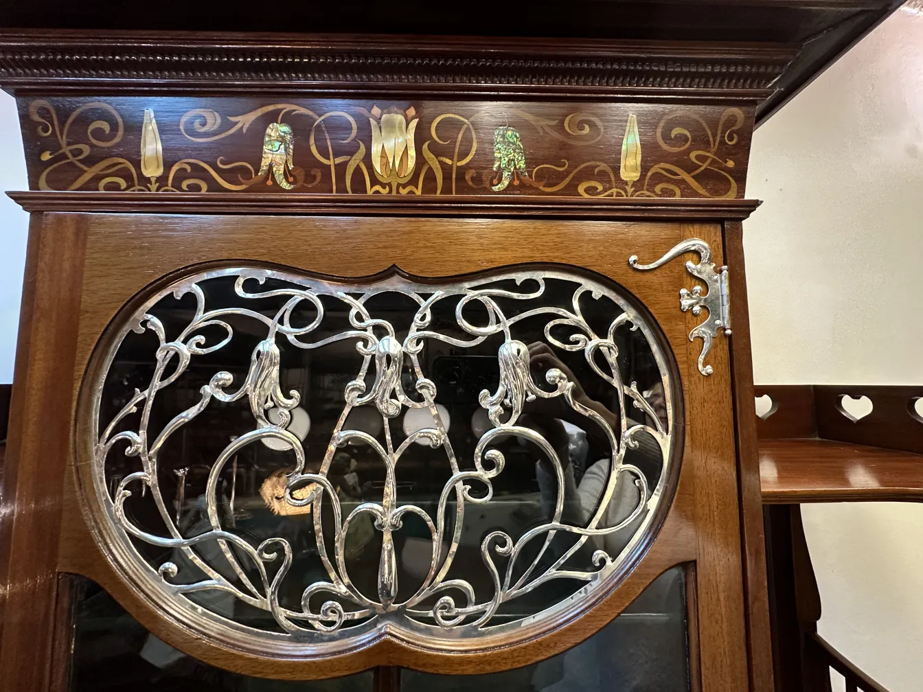 antique display cabinet by Shapland & Petter with ornate design