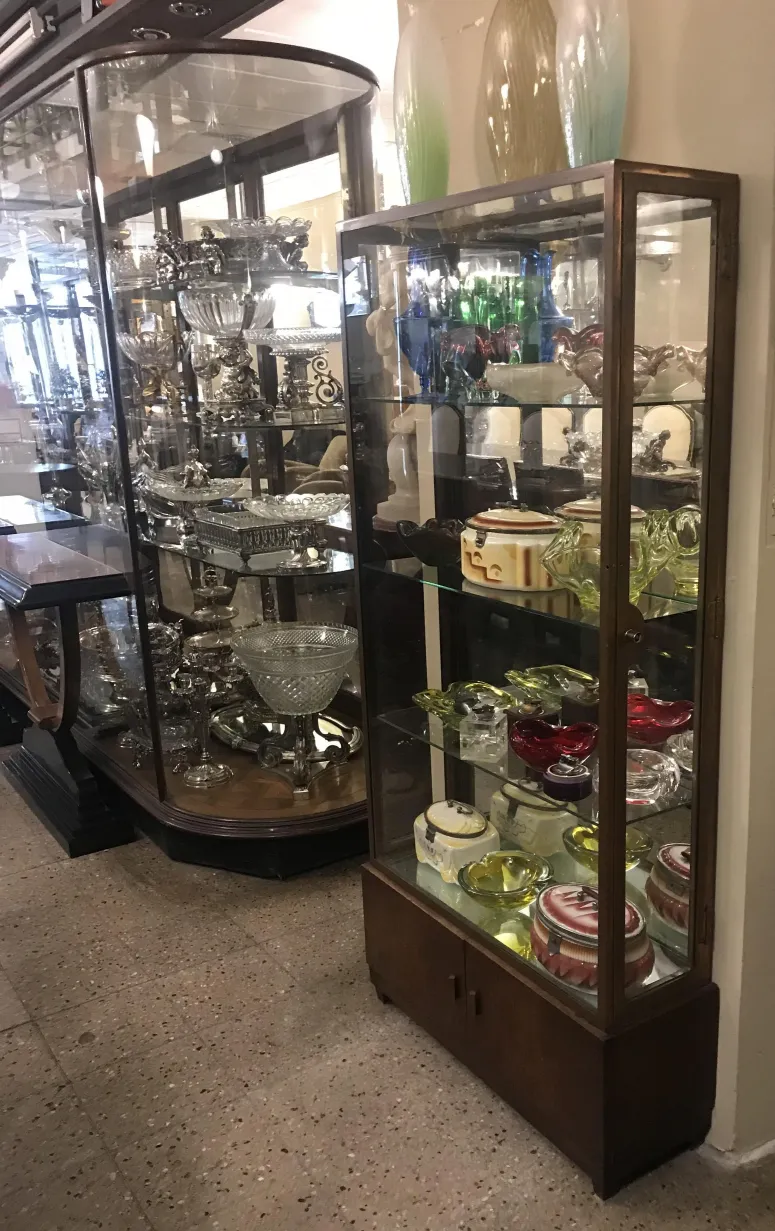 antique display cabinet showcasing decorative items