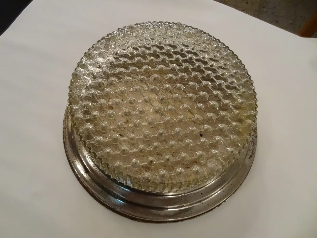 Antique ceiling light with bubble design. Ideal for illumination.