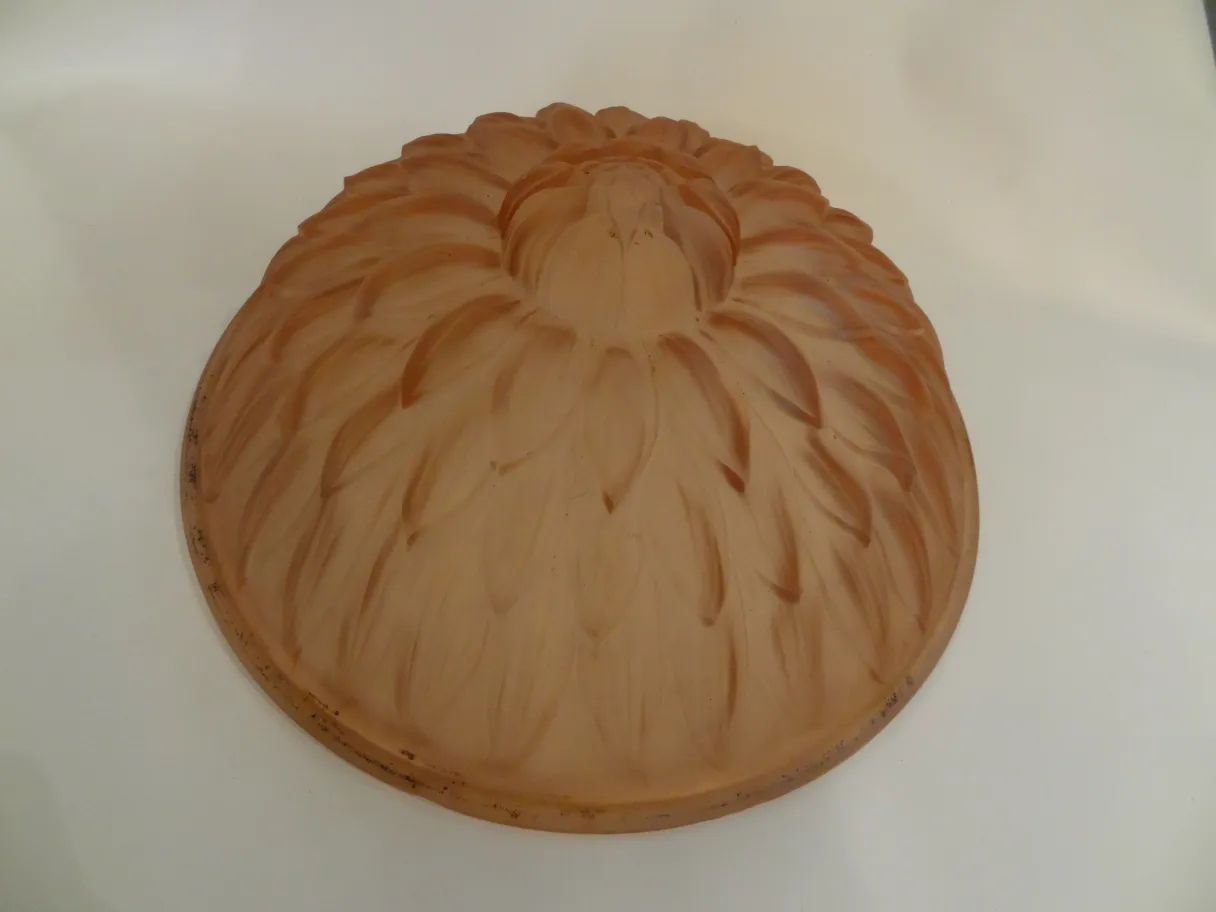 antique ceiling light with decorative relief design