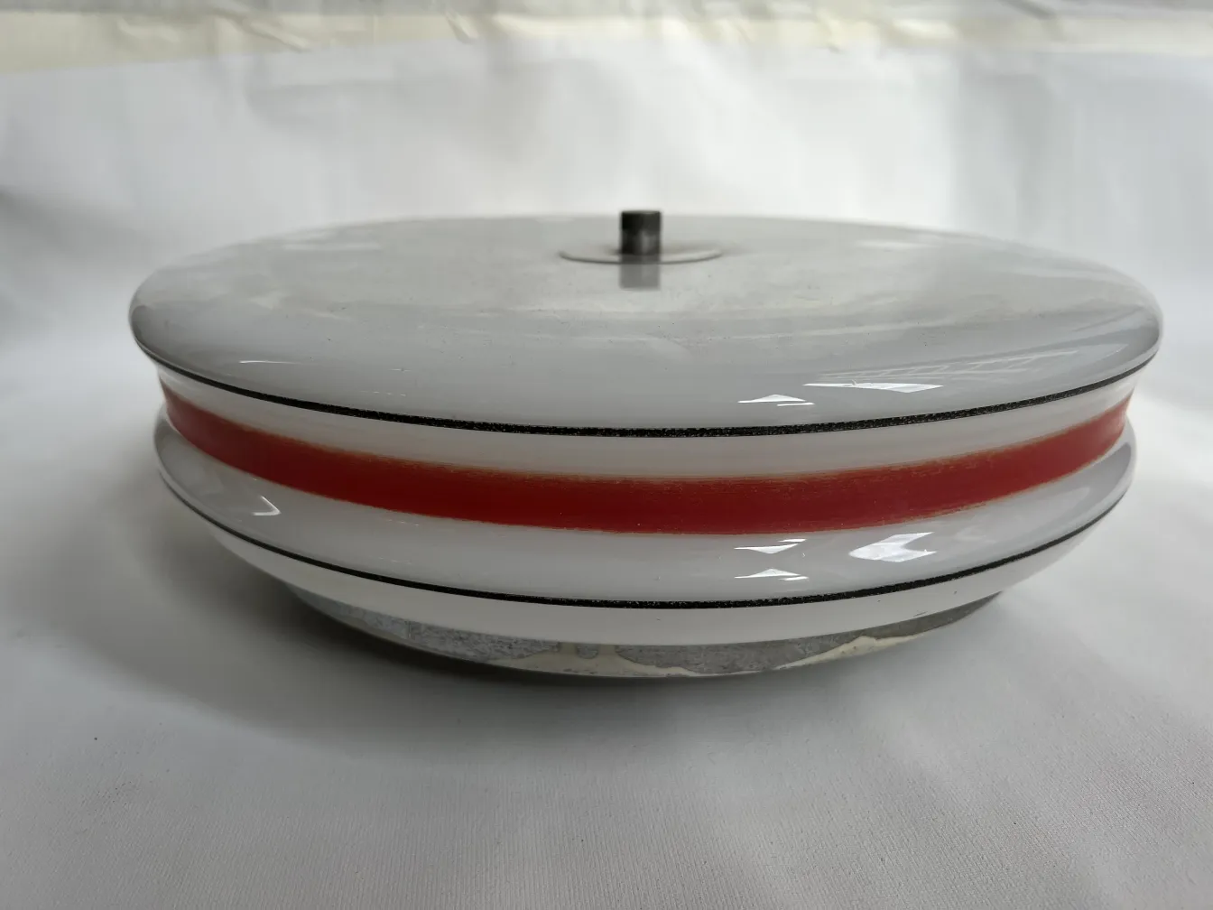 circular antique ceiling light with red and white details