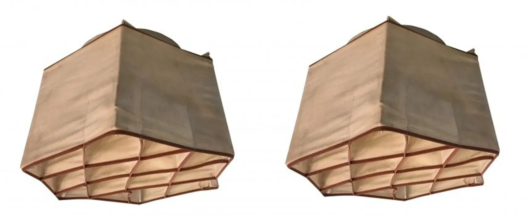 Pair of antique ceiling lights in light color, simple and elegant style, classic ambiance.