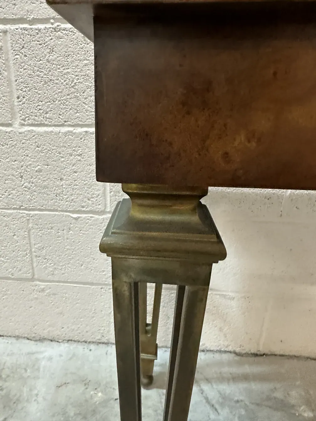 antique console with bronze details, white background