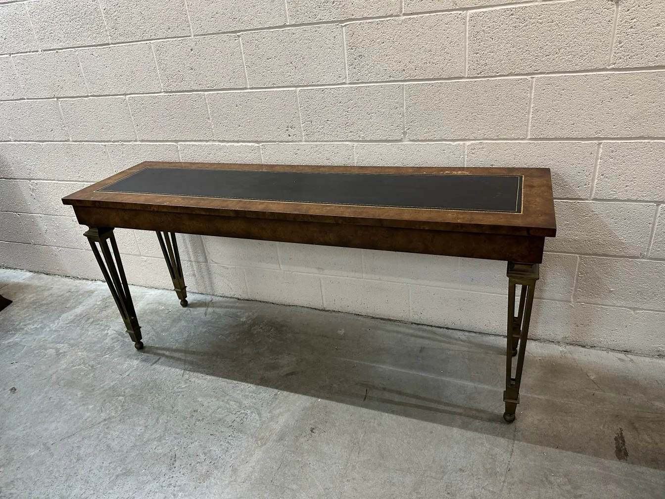 antique decorative console with elegant legs and sophisticated design, neutral background