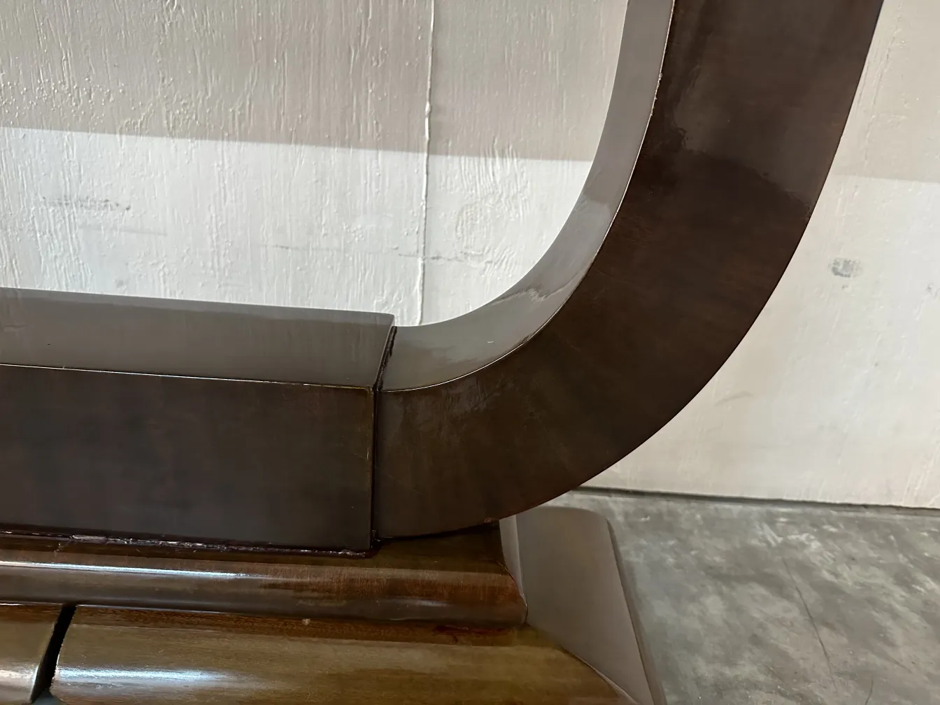 antique decorative console with elegant shape and smooth contours in a classic setting