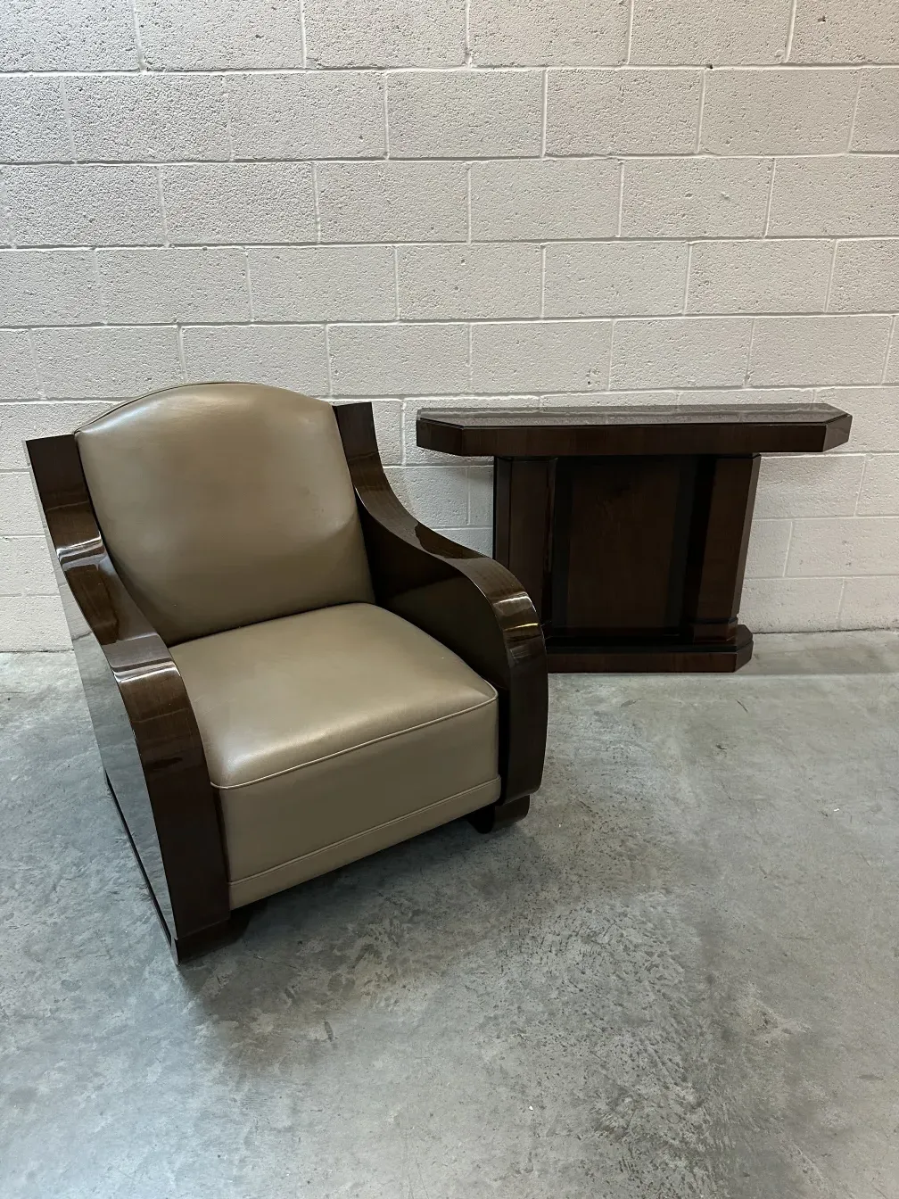 Two elegant antique consoles in a simple setting