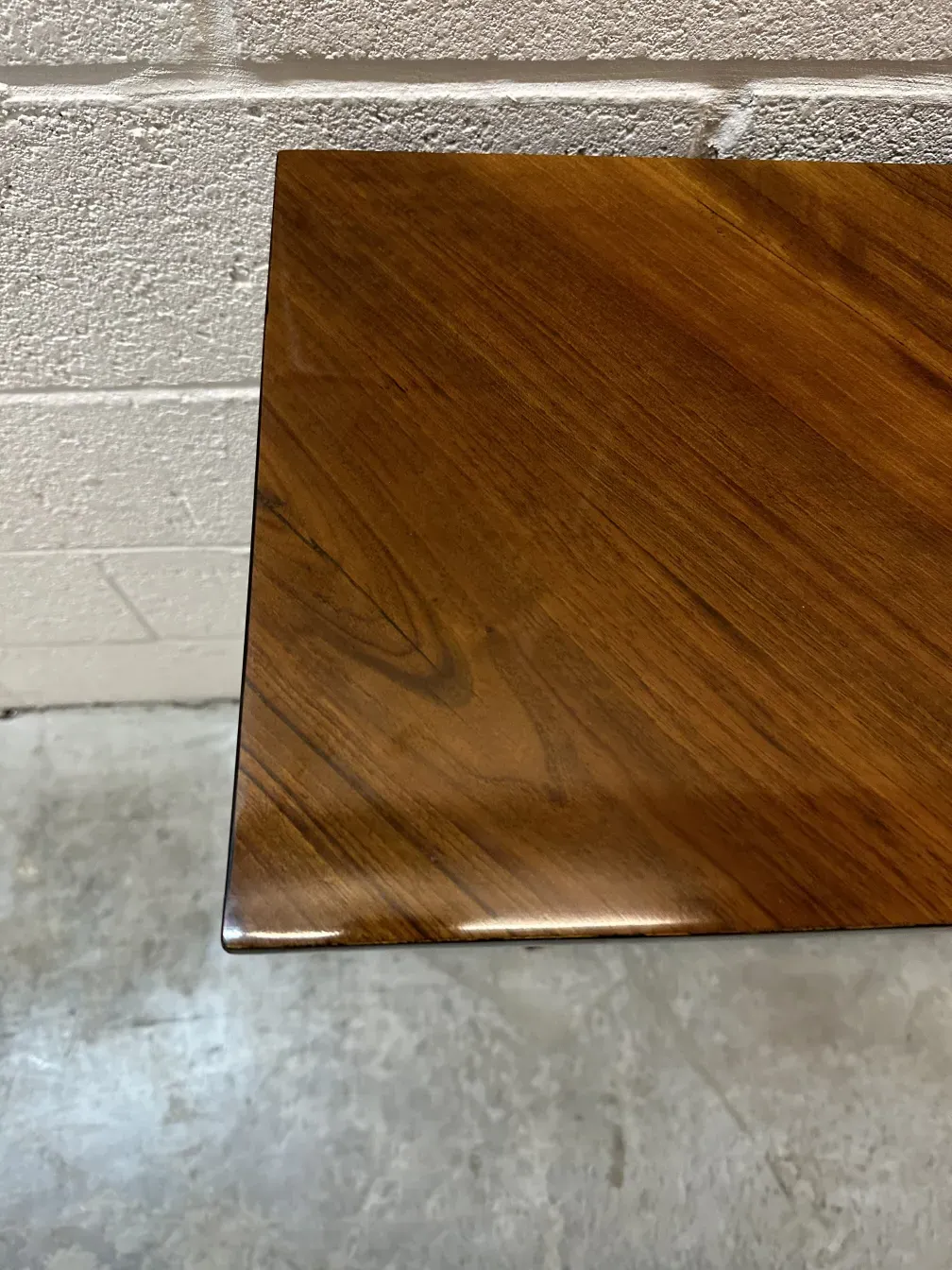 two antique consoles with a smooth and elegant finish