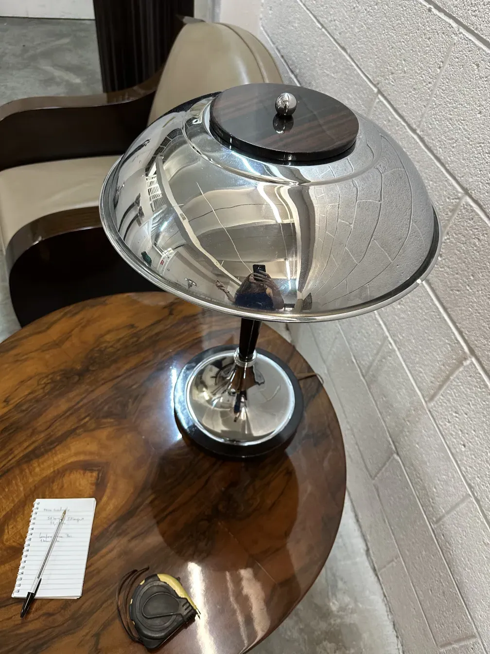 Two antique table lamps with shiny bases in a cozy setting