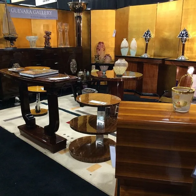 two antique table lamps in an elegant setting with furniture