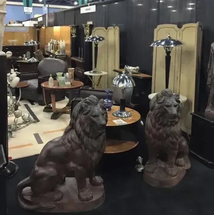 two antique table lamps in a well-decorated setting