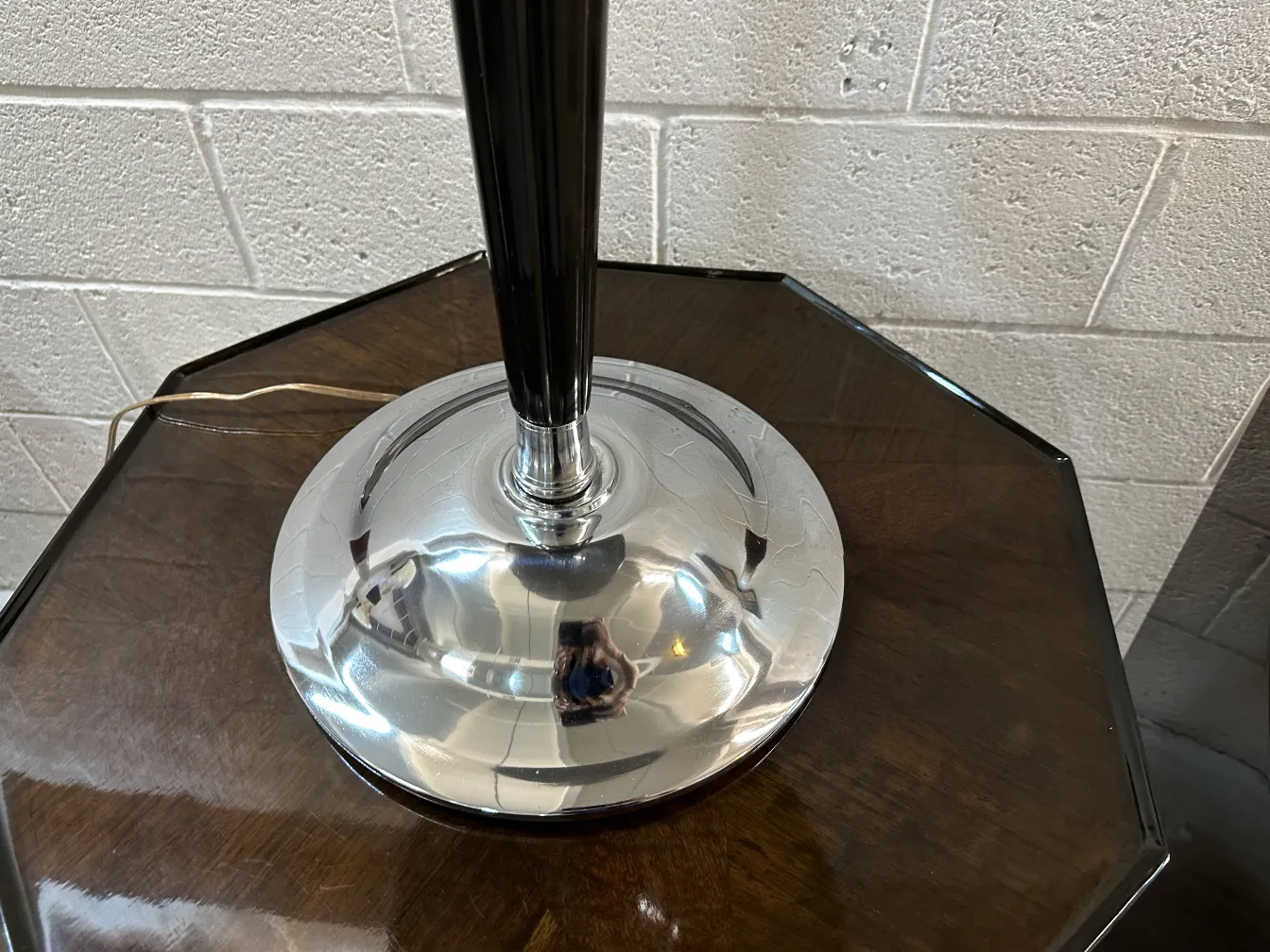 View of 2 antique table lamps on a table