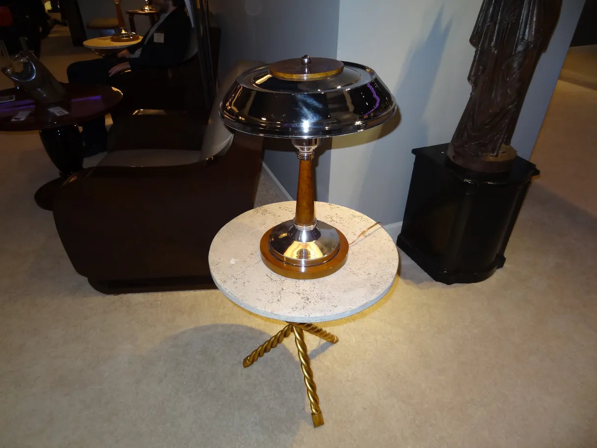 two antique table lamps on a marble table