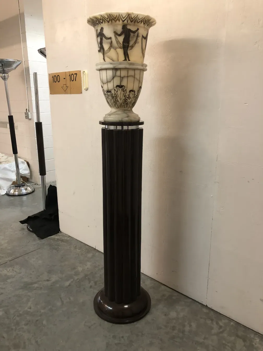 two antique floor lamps with decorative details on the base and shade