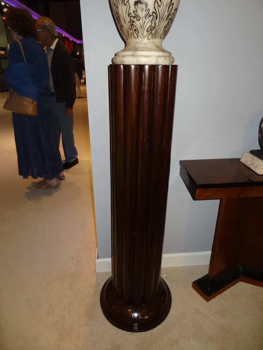 Two antique floor lamps in a classic setting.