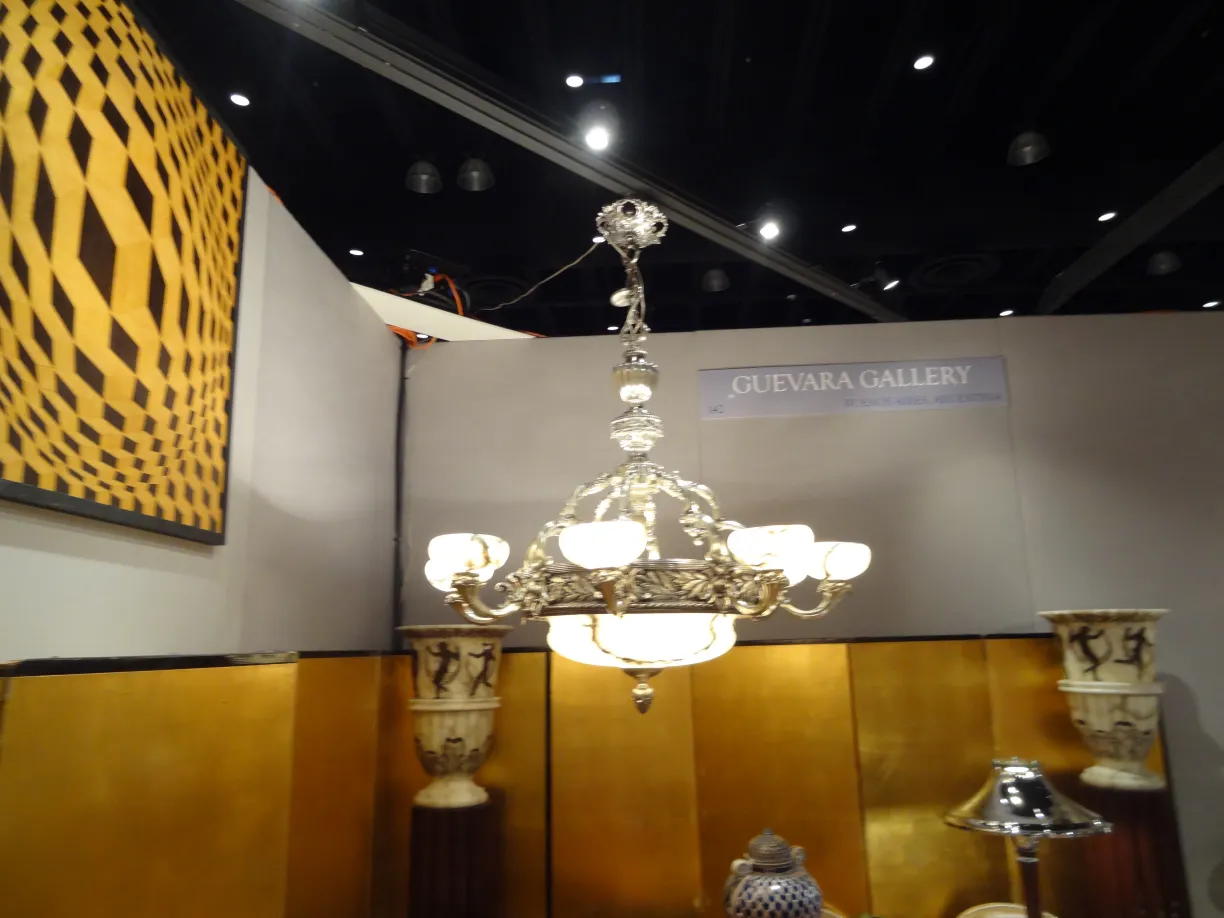 Set of 2 antique floor lamps in decorative setting