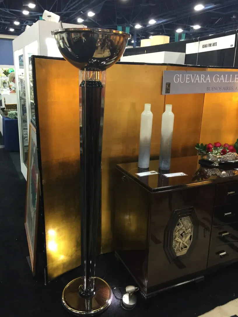 Vintage floor lamps with shiny finish in a decorative setting