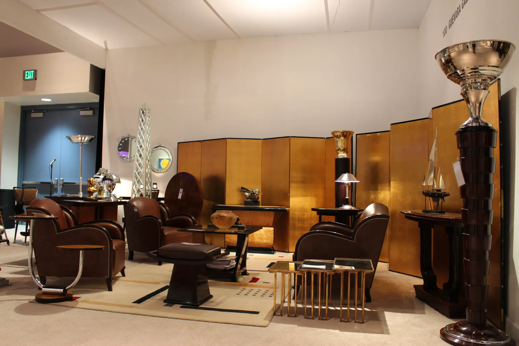 two antique floor lamps in an elegant display room