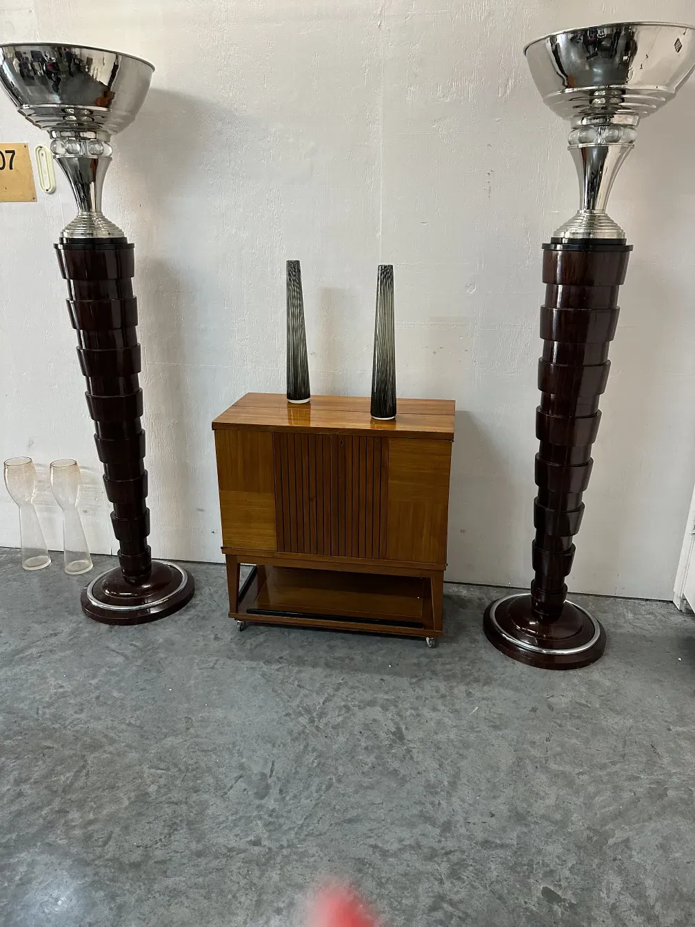 Set of 2 antique floor lamps in an elegant setting