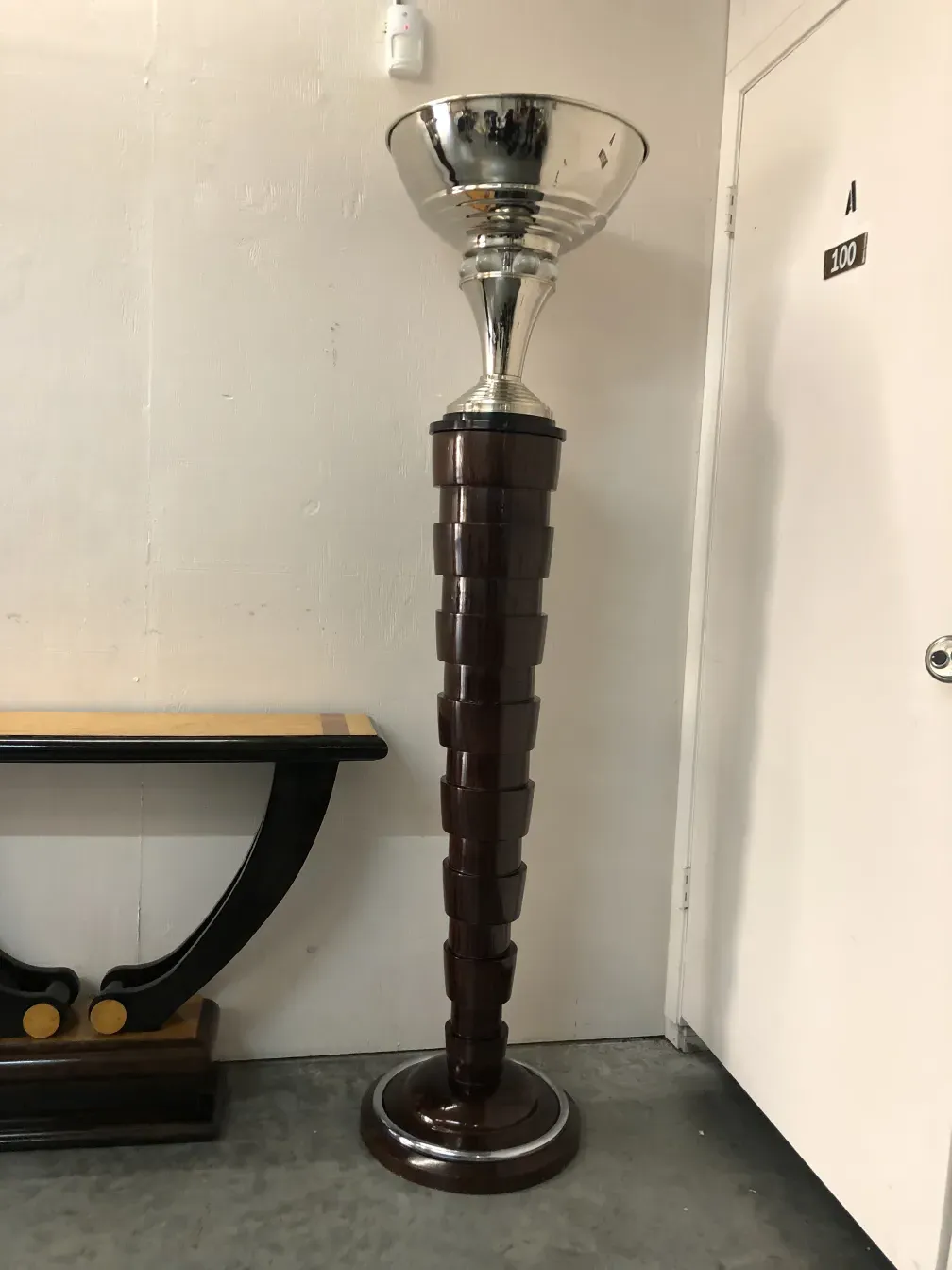 Antique floor lamps with elegant base, warm ambiance.