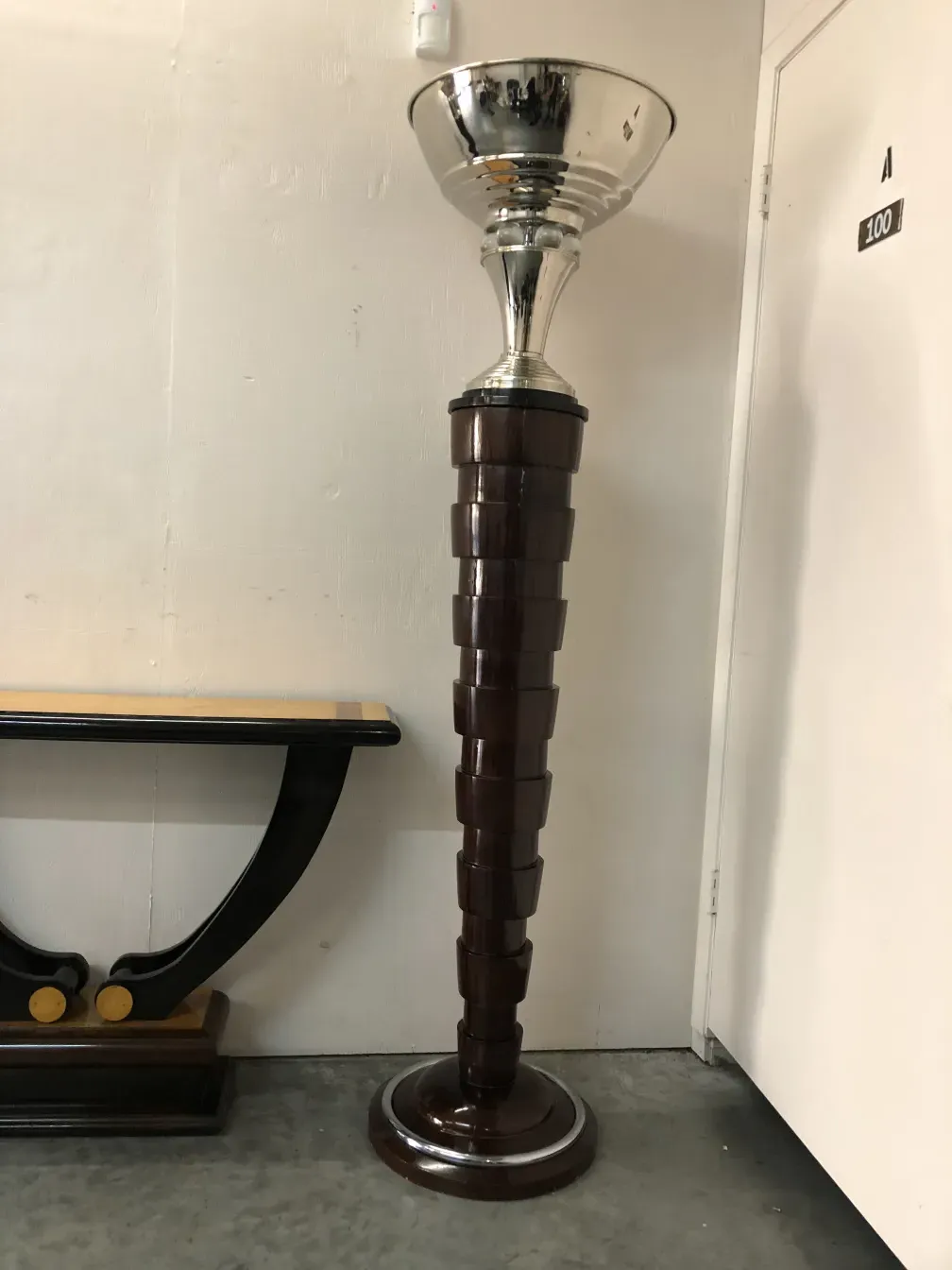 Pair of antique floor lamps with decorative base and shiny shade