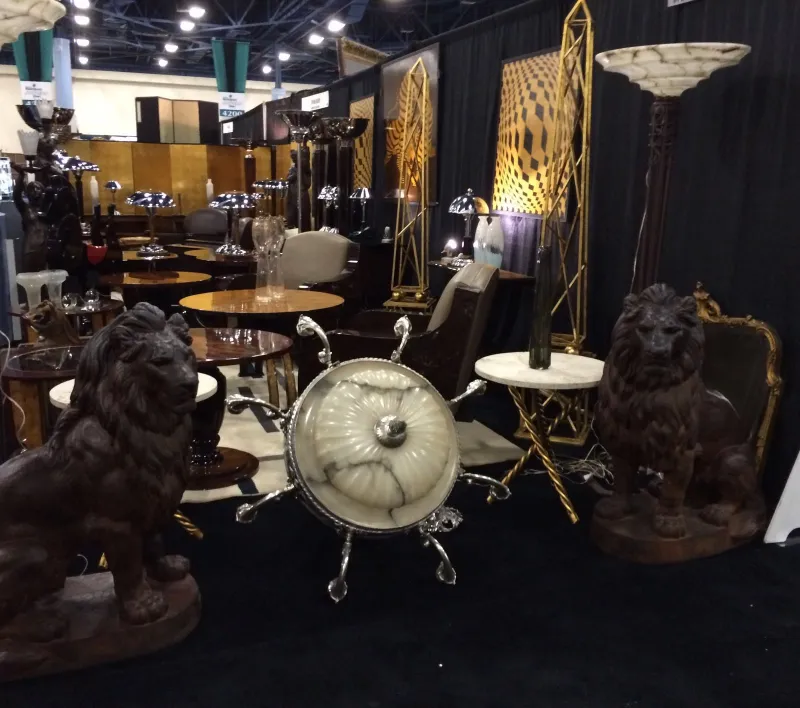 2 antique floor lamps in a classic setting with decorative lions