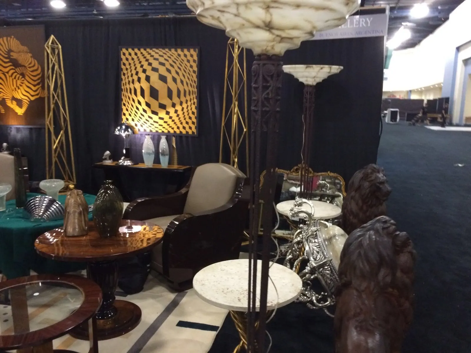 Two antique floor lamps displayed in an elegant setting