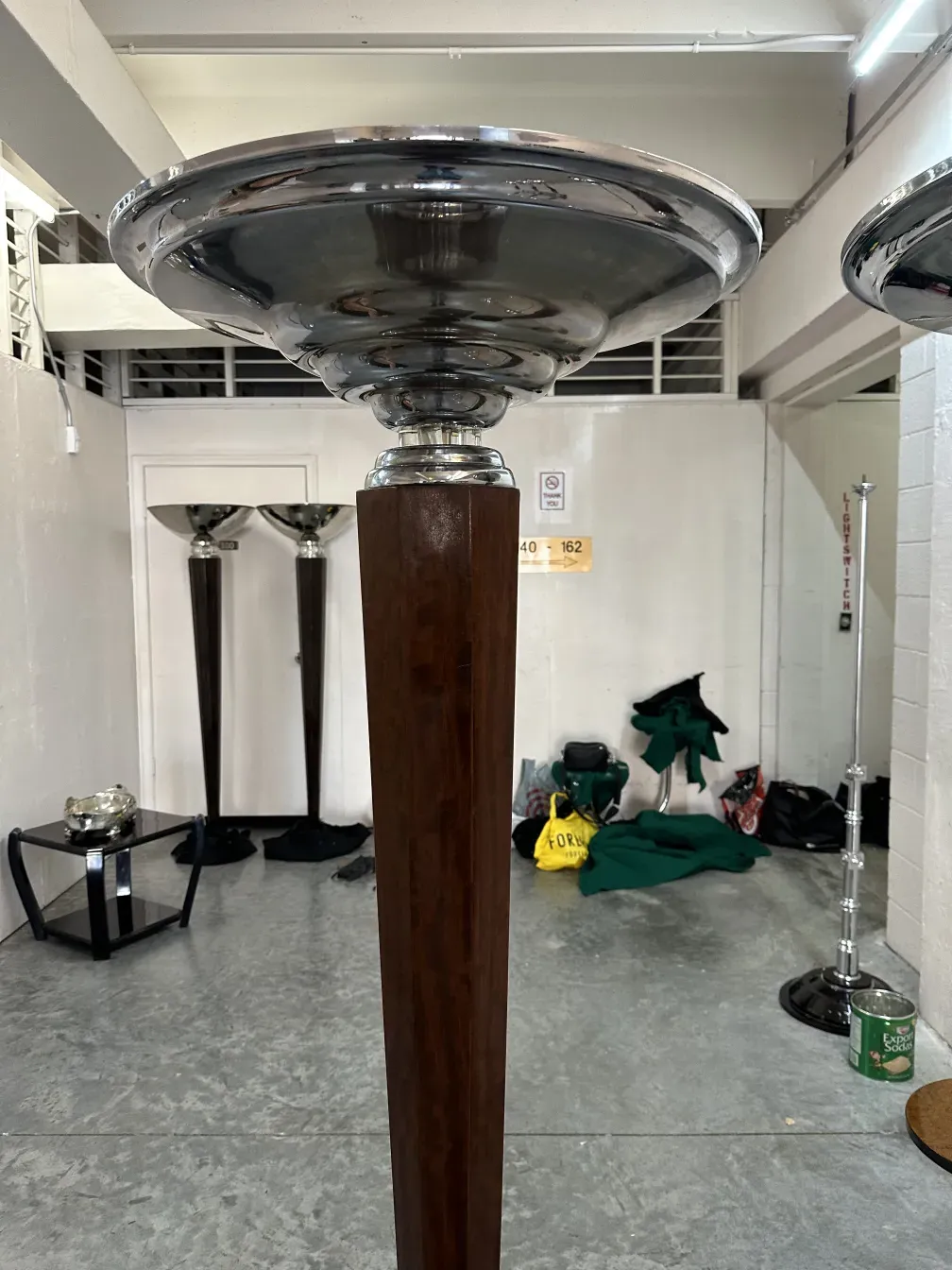 two antique floor lamps with appealing design in setting