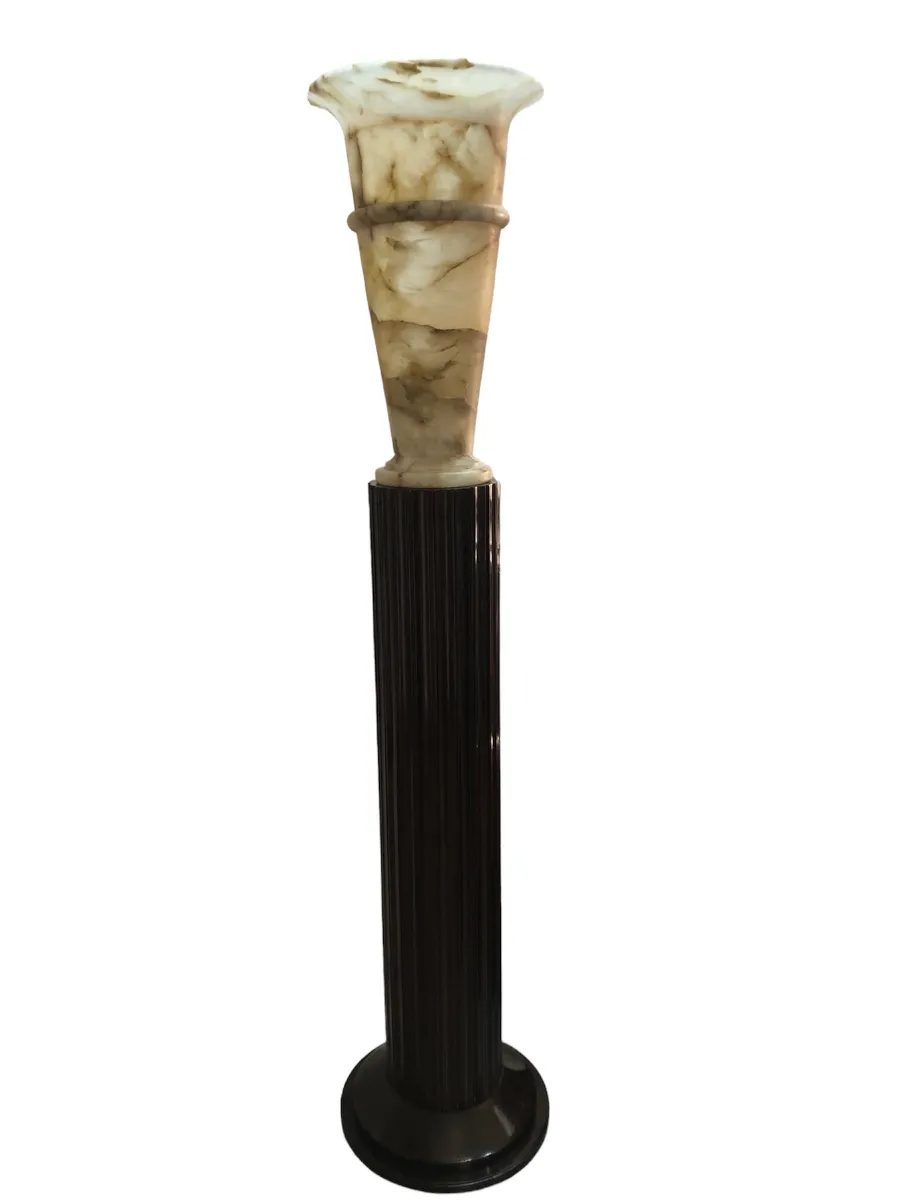 two antique floor lamps with decorative design in a cozy setting