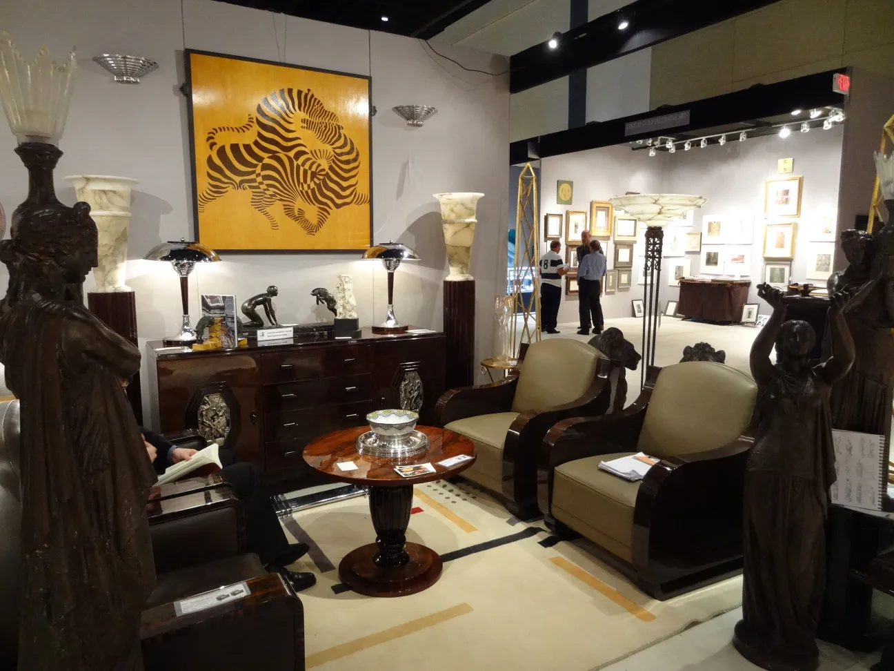 Two antique floor lamps in an elegant setting with sophisticated decor