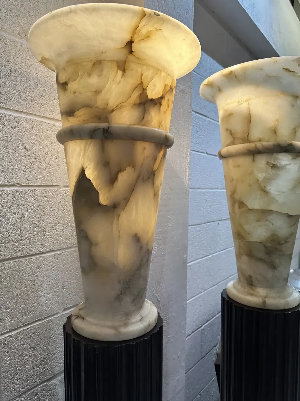 Two antique floor lamps with stylish bases