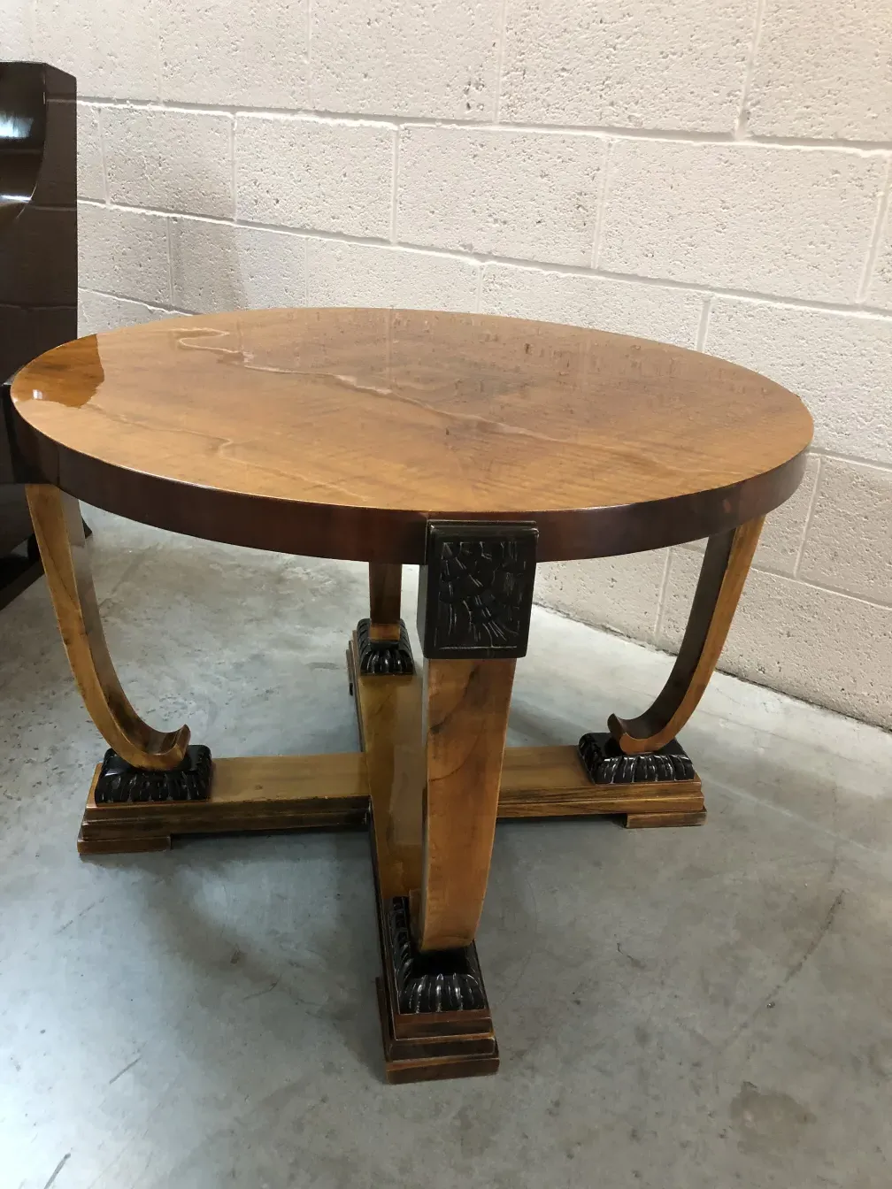 antique coffee table with detailed base