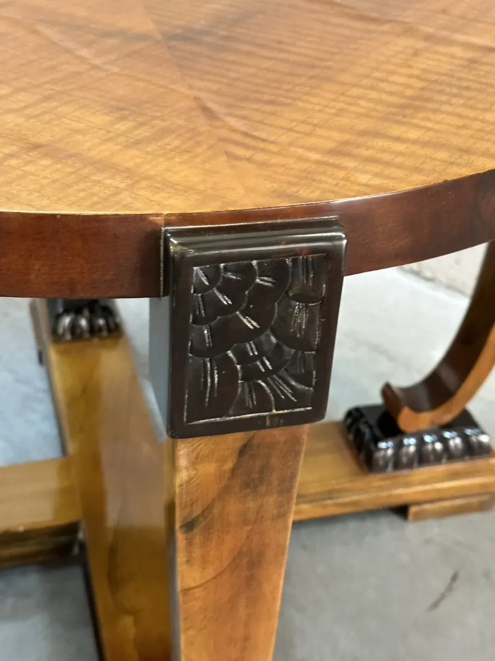 close-up view of an antique coffee table with decorative details