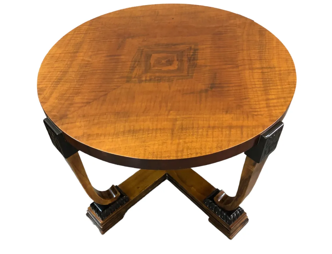 antique coffee table with round top and elegant legs