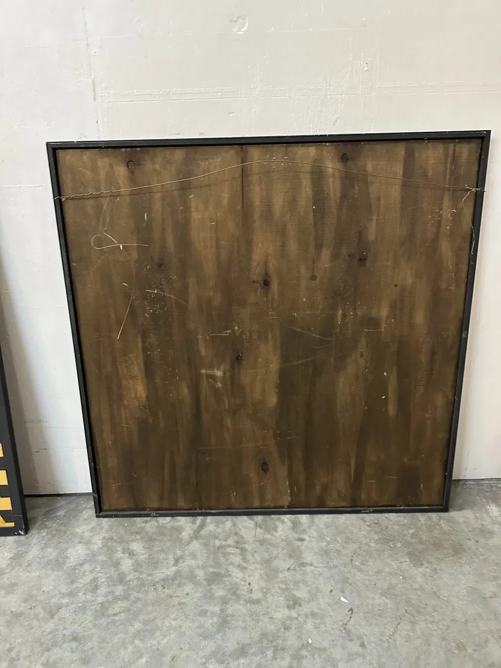 antique marquetry with black frame on light background