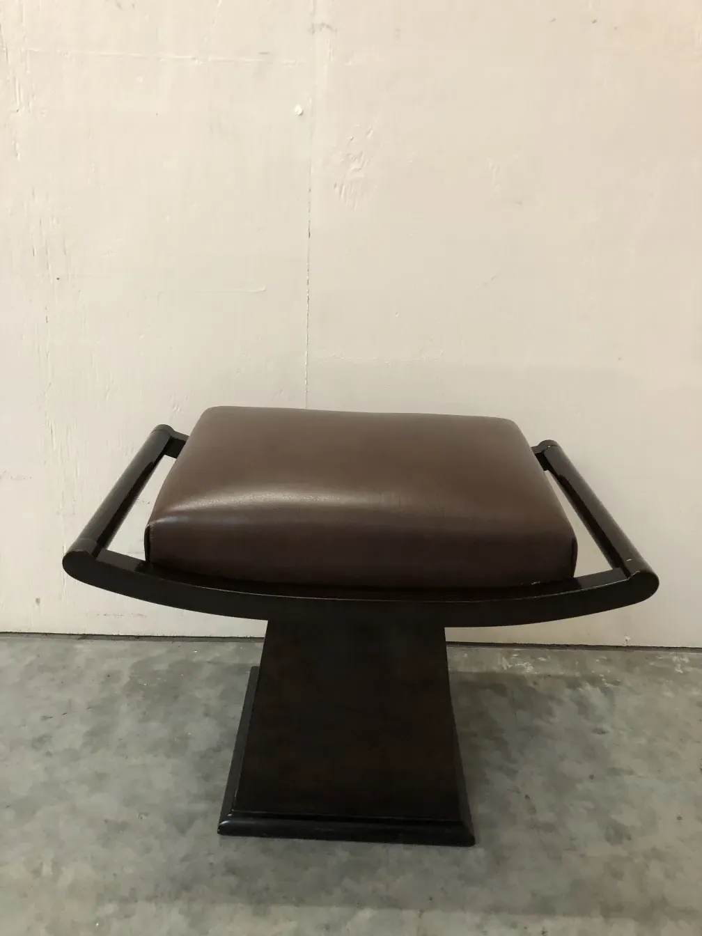 antique sidewalk chair with stylish arms, neutral background.