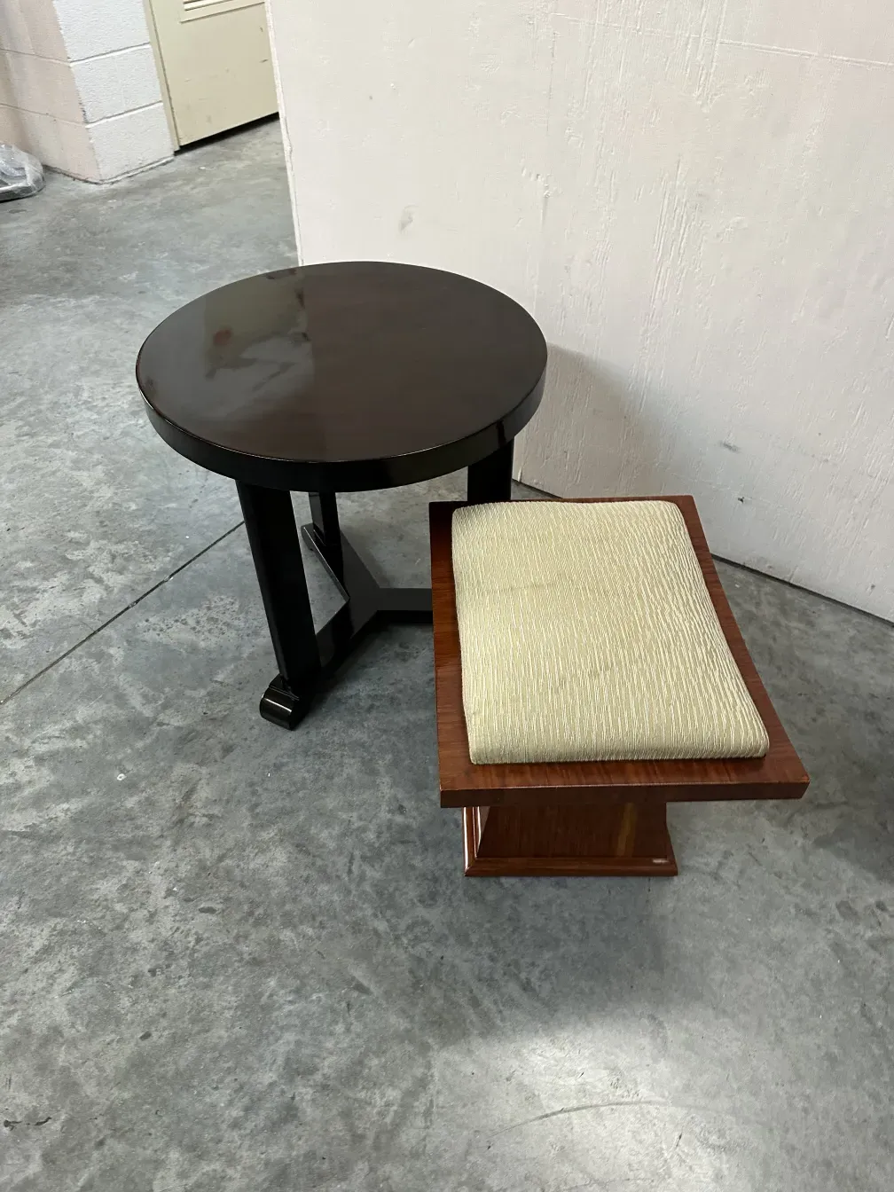 antique stool with cushion in neutral setting
